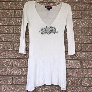 Say What? White tunic with bedazzled front